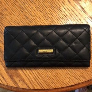 St. John black quilted wallet.